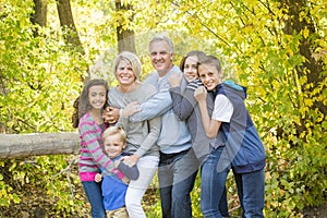 Beautiful family portrait outdoors on a sunny day