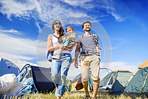 Beautiful family at summer festival