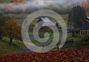 Beautiful and famous house and barn with fog in Woodstock Vermont