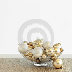 Beautiful, fancy silver and gold Christmas ornaments in glass bowl with white background. Simple, modern, luxe, luxury holiday photo