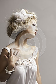 Beautiful fantasy fairy woman in white