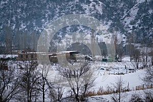 Beautiful farmer house in the West Tianshan Mountains in winter