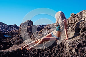 Beautiful fashion blonde at the seashore