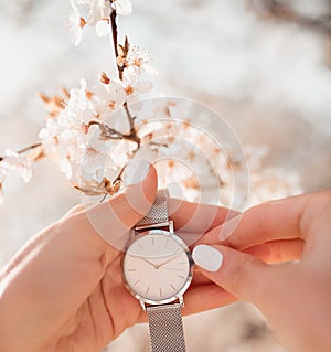 Beautiful fashion elegant white watch on woman hand