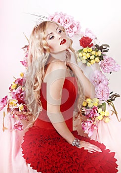 Beautiful Fashion Girl with red makeup and Roses.