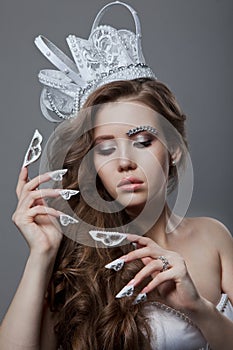 Beautiful fashion queen bride woman model. Manicured nails.