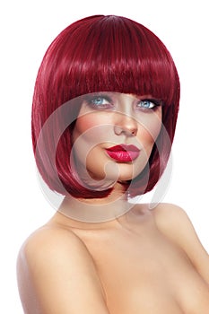 Beautiful fashion redhead girl with bob haircut and stylish make