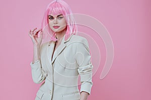 Beautiful fashionable girl in White blazer pink hair Glamor Cosmetics color background unaltered
