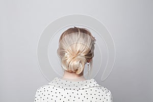 Beautiful fashionable hairstyle. Pretty woman back and head on white background