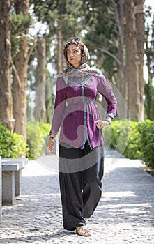 Beautiful iranian woman in Fin gardens in Kashan, Iran