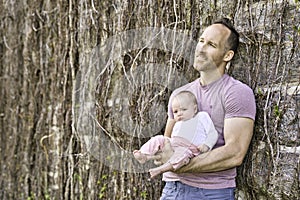 Beautiful father And Baby outdoors. Dad and her Child playing together