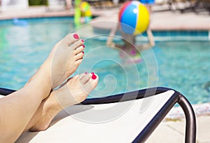 Beautiful Feet and toes by the swimming pool