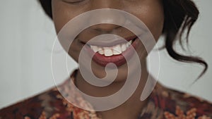 Beautiful female african american university student portrait, happy laughing woman, close up smile with white teeth