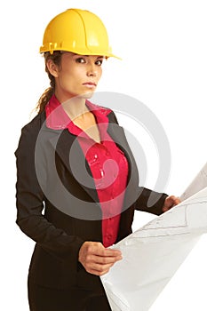 Beautiful female architech with business plans photo