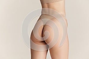 Beautiful female body on white background. Beauty, cosmetics, spa, depilation, diet and treatment, fitness concept.