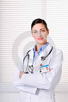 Beautiful female doctor with stethoscope