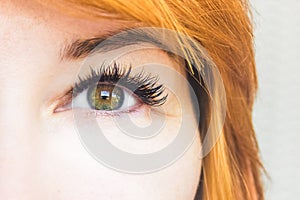 beautiful female eye with long eyelashes close up