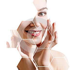 Beautiful female face in honeycombs. Spa and face lifting concept.