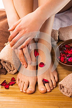 Beautiful female feet and hands, spa salon, pedicure and manicure procedure