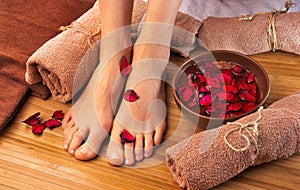 Beautiful female feet, spa salon, pedicure procedure