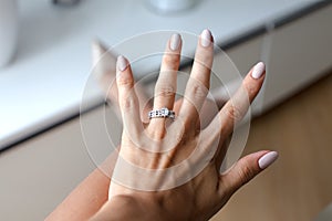 Beautiful female hand with elegant diamond ring