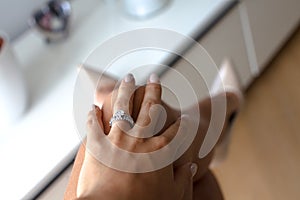 Beautiful female hand with elegant diamond ring