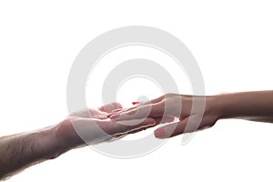 Beautiful female hand lies on the hairy male hand on a white background