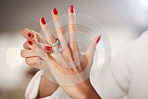 Beautiful female hands with red nails