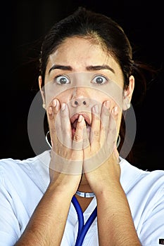 Beautiful Female Nurse And Fear Wearing Scrubs