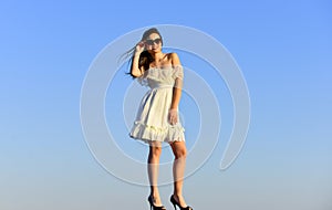 Beautiful female. pretty young beautiful woman in sunglasses. Summer outfit. Portrait of the beautiful girl. beach