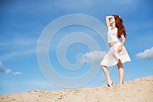 Beautiful female on the sand dunes