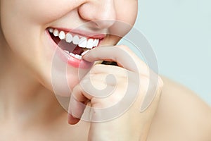 Beautiful female smile after teeth whitening procedure. Dental care. Dentistry concept