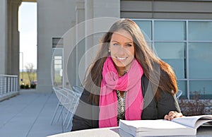 Beautiful female student outside of building