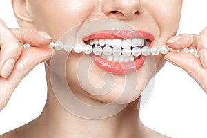 Beautiful female teeth smile and pearl necklace, Dental Health Concept Teeth whitening. Dental clinic patient. Image photo