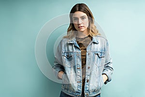 Beautiful Female Wearing Denim Jacket In Studio