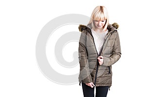 Beautiful female zipping winter warm jacket