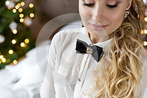 Beautiful festive accessories for the holidays, a girl with a butterfly on her shirt, holiday dresses