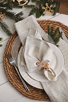 Beautiful festive place setting with stylish decor for Christmas dinner on white wooden table, flat lay