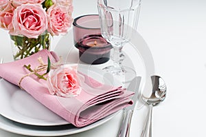 Beautiful festive table setting with roses