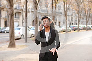 Beautiful fiancee talking on smartphone with close up of face.