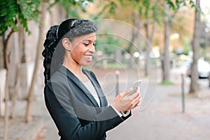 Beautiful fiancee talking on smartphone with close up of face.