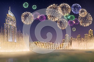 Beautiful fireworks above dancing fountain Burj Khalifa in Dubai, UAE