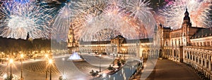 Beautiful fireworks above Spain Square on sunset, Seville