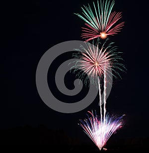 Beautiful fireworks bursting in the evening sky