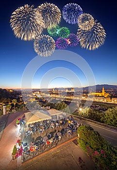 Beautiful fireworks under Arno River and Ponte Vecchio