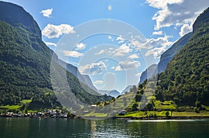 Beautiful Fishing village Undredal close the fjord near the beautiful mountains. Aurlandsfjord, Flam, Norway