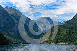 Beautiful fjord landscape with a trace from the boat