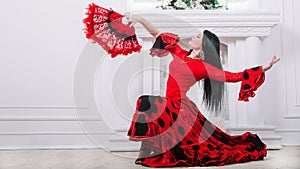 Beautiful flamenco dancers performing a fiery dance