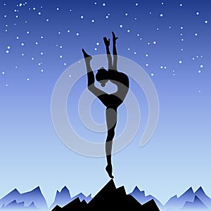 Beautiful flexible girl gymnast staying on one