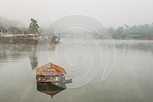 The beautiful floating house in the river at Sangklaburi in Kanchanaburi, Thailand